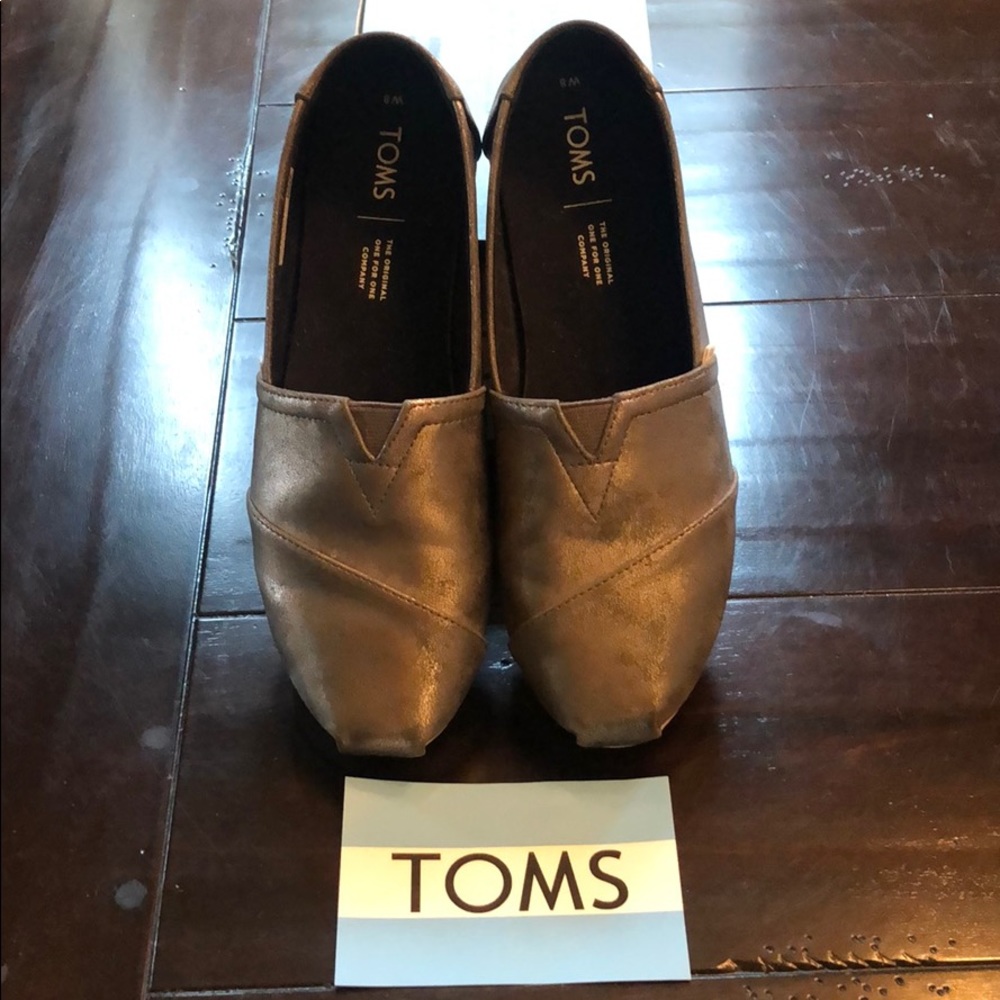 Barely worn gray/silver iridescent Toms, s…